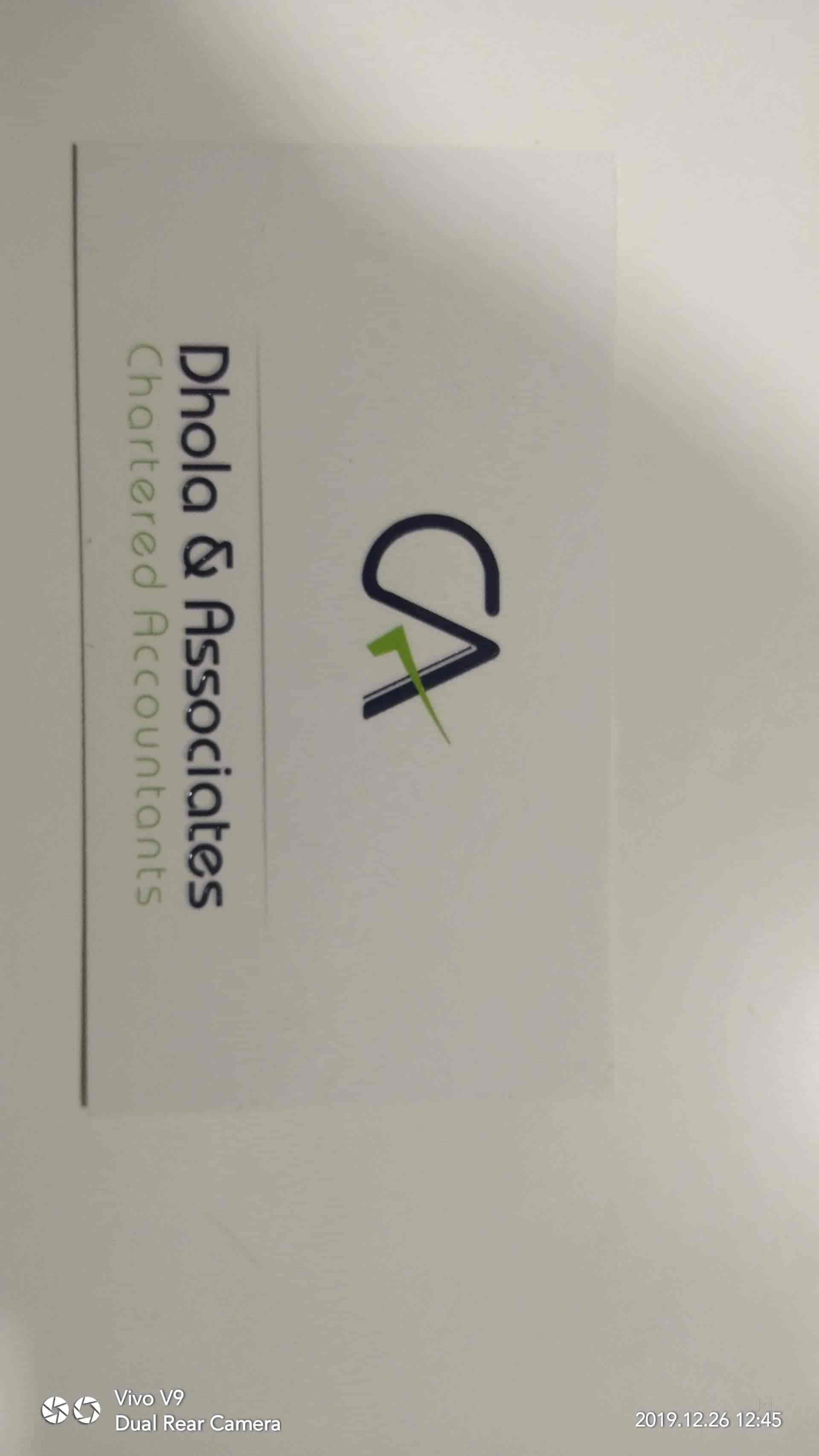 Dhola & Associates
